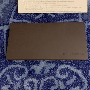 Louis Vuitton envelope with LV paperwork
